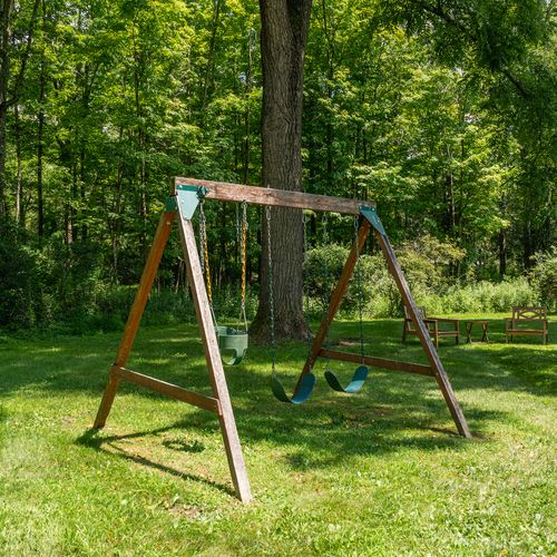 This play set is perfect for kids, with a place for parents to relax close by.