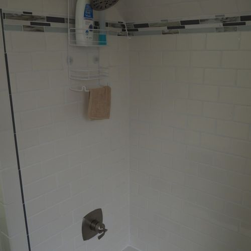 Bathroom #2 (upstairs):  there is a full bathroom upstairs with a combination bathtub / shower, toilet, vanity, sink, and mirror.
