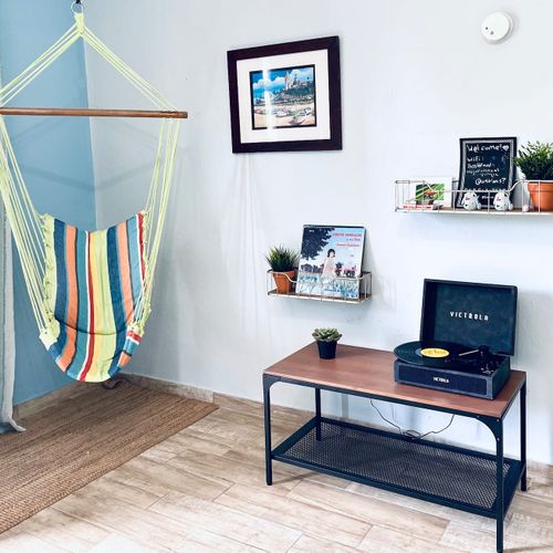 Smart design for modern travelers: Our living area features a practical and comfortable sofa bed, making it ideal for families or groups seeking adaptable accommodations.