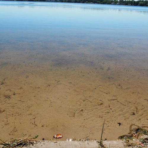 Overview:  the lakefront has a family-friendly sandy bottom, which is rare and is great for kids to play in the lake.