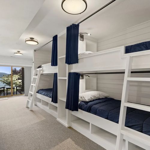 BEDROOM #5 (LOWER LEVEL):  Features 2 built-in bunk beds (sleeping 4 people in total) along with a secondary washer and dryer.