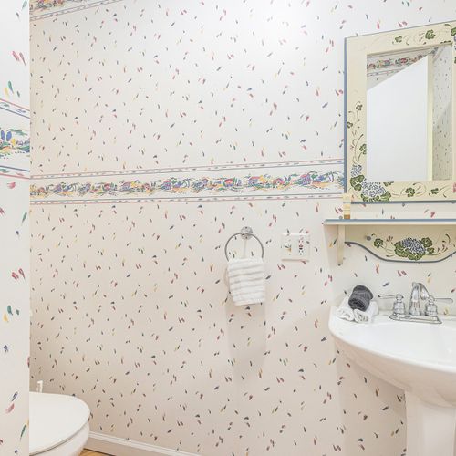 BATHROOM #2:  Convenient half-bath near the family room.