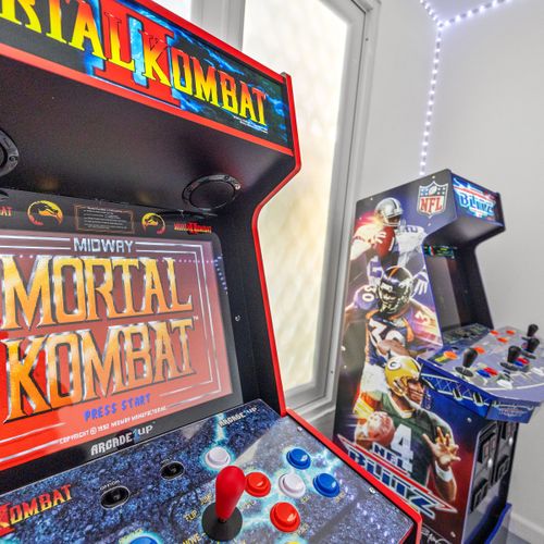 Transform your stay into a gaming adventure with arcade machines and neon lights.
