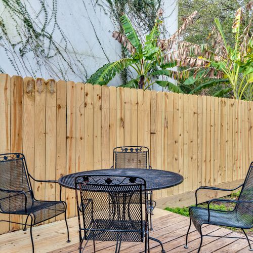 Dine al fresco at the bistro table tucked inside a private fenced yard.