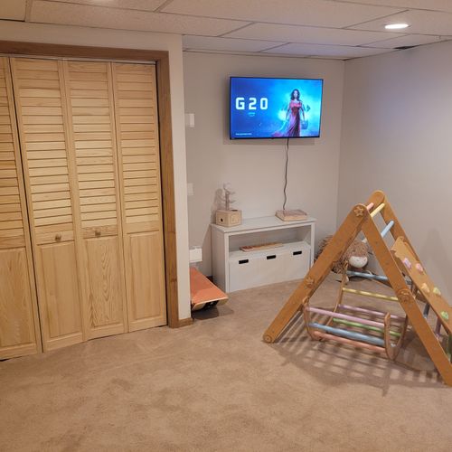 Living room #2:  the basement's living room with a kid friendly area for little ones to enjoy