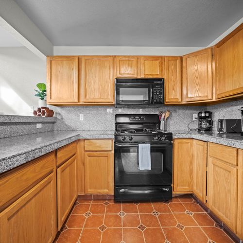 Well-equipped kitchen with modern appliances and generous counter space