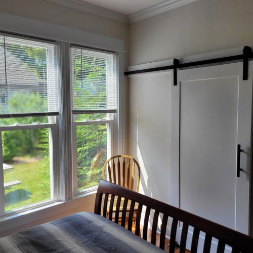 Bedroom #1 (main floor):  features a queen-size bed and its own private en suite full bathroom, dresser, nightstand, and closet.