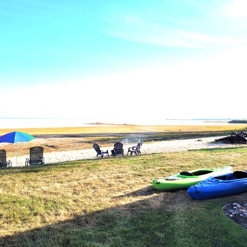 EXTERIOR:  Looking out at Lake Huron and the private beach from the house