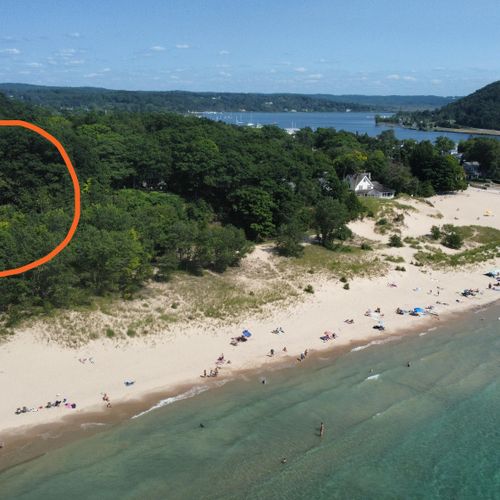 Overall:  the home is in a truly incredible location overlooking lake michigan and frankfort beach.