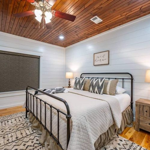 This room features a King Bed set with a premium mattress and luxury linens