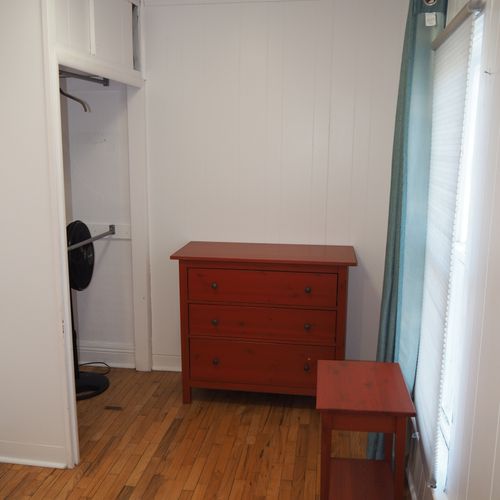 Bedroom:  the bedroom is small, but comfy and cozy, with a super comfortable pillow-top queen-size bed, nightstand, dresser, lamp, ceiling fan, and closet.