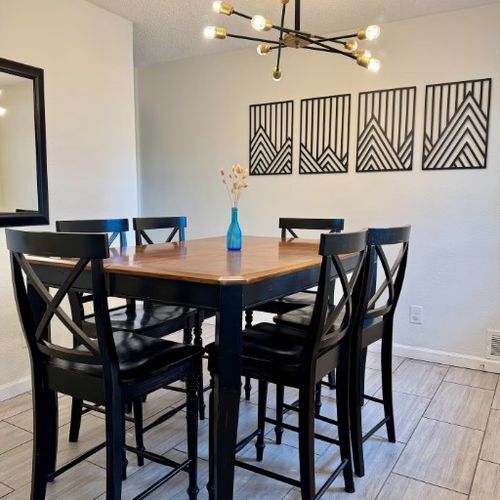 Family &Amp; Dog-Friendly Retreat With Fire Pit 104 Gather around a sleek table designed for comfortable dining and connection.