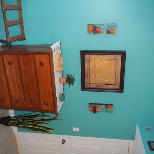 Bedroom:  very comfortable bedroom with a queen-size bed, ceiling fan, dresser, and mirror.