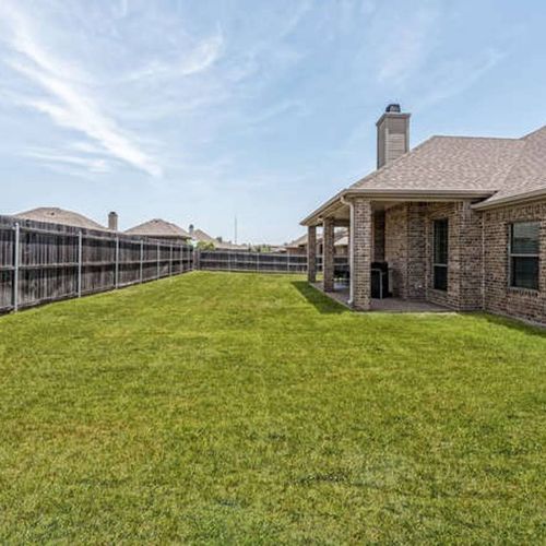 Pet friendly with fully fenced yard, Covered porch with BBQ grill & outdoor seating