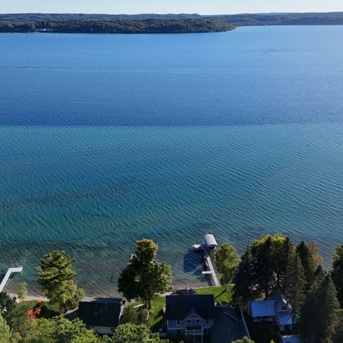 EXTERIOR:  Crystal Lake from above the cabin, highlighting the multiple colors of the lake