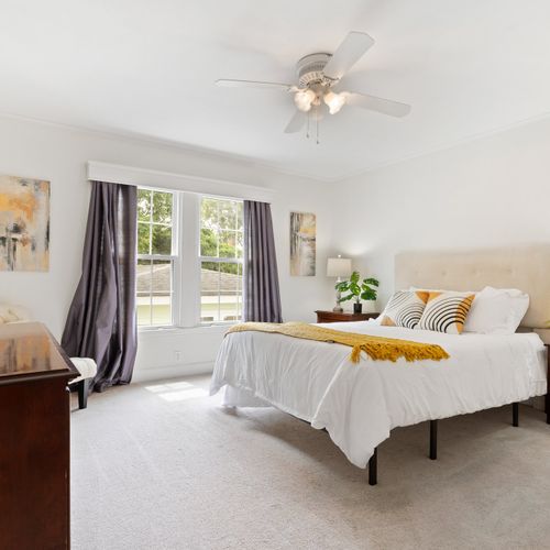 Fourth queen bedroom with nice natural lighting! | Upstairs