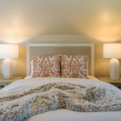 The Waterview bedroom includes luxury sheets and linens for a restful sleep.