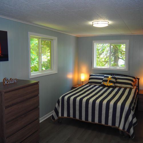 Bedroom #2 (second floor):  large upstairs bedroom with queen-size and twin bed.