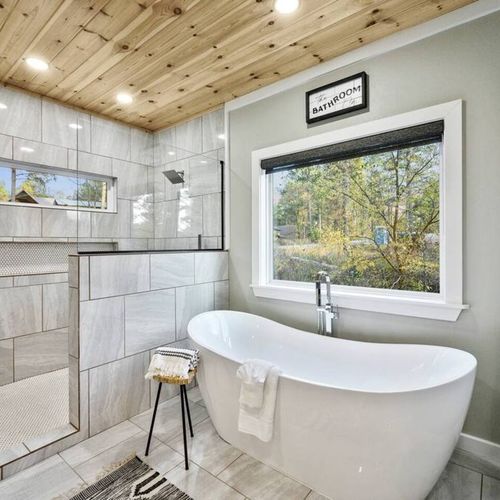 An oversized soaking tub and walk-in shower both in the private bath!