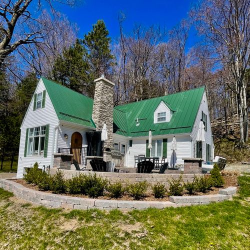 OVERVIEW:  The front of the house in early spring