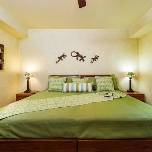 The master bedroom is the perfect place to rest after a long day on the beach.