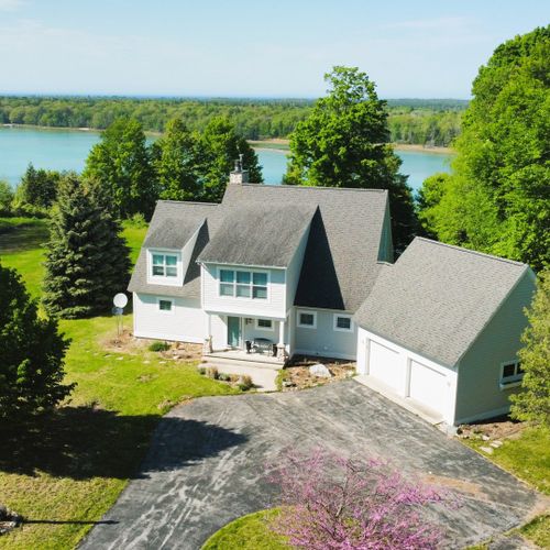 Overall:  aerial photo of the home with pristine long lake in the background.