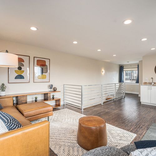 Relax and unwind in our third-floor sitting area, complete with a mini bar for your enjoyment!