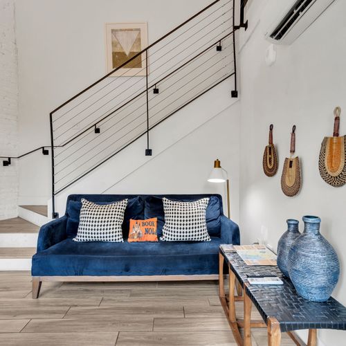 Chic and cozy lounge space with local flair—perfect for kicking back and planning your New Orleans adventures.