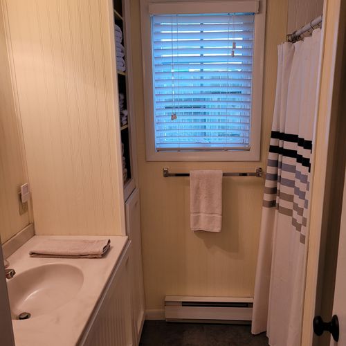 BATHROOM #2 (FIRST FLOOR):  Full bathroom on the first floor with a walk-in shower