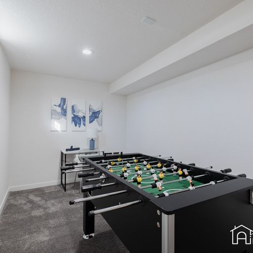 A small desk is included in the game room for your use. The foosball table will provide fun for hours!