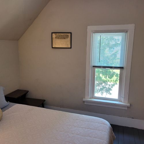 BEDROOM #2 (SECOND FLOOR):  Features a queen-size bed, nightstands, lakeview, and closet.
