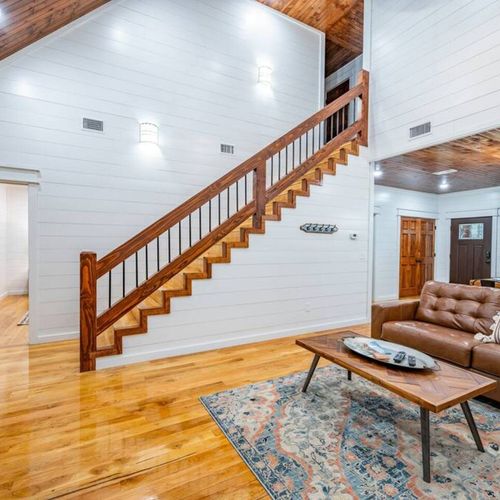 The stairs lead to 2 King Suites!