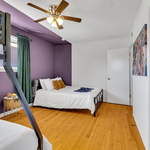 Bright, airy, and perfect for groups! This cozy bedroom offers both a double bed and bunk beds—ideal for family or friends looking to share space comfortably.