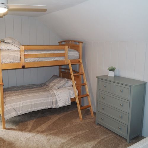 Bedroom #7 (second floor):  has two twin-on-twin bunk beds plus a separate twin bed, thus sleeping 5 people.
