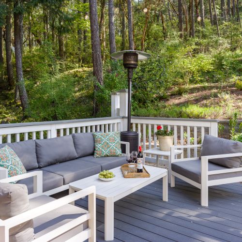 Private flower gardens with seating, firepit and dining