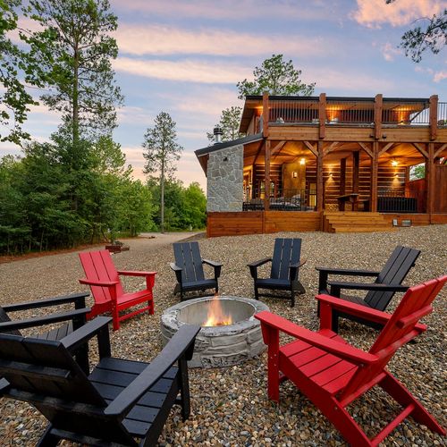 Firepit with Adirondack chairs.