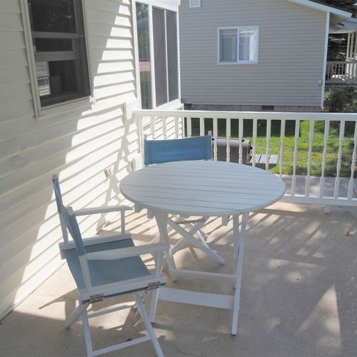 Exterior:  the front porch in summer.