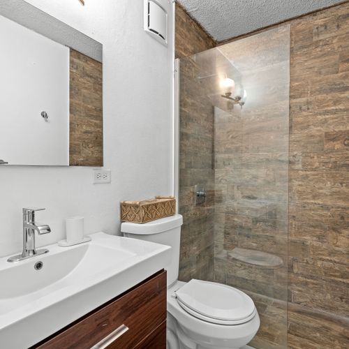 Convenience meets style with twin basins in our comfy bathroom.