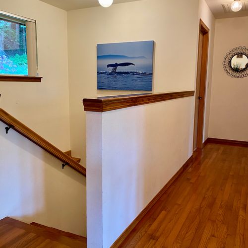 Down the hall from the common area are the master bedroom ensuite and guest bedroom with a full bathroom in the hallway.