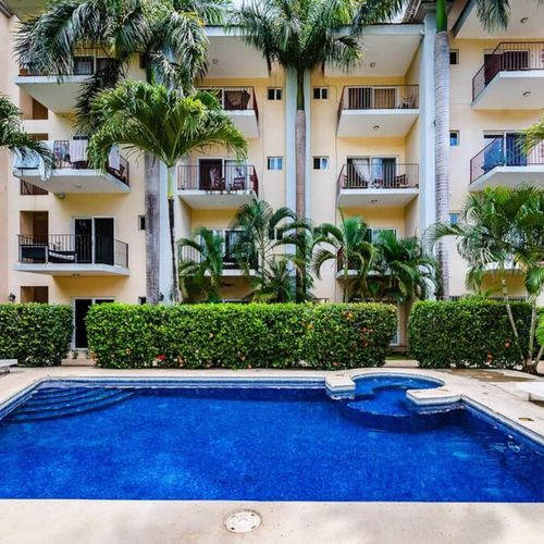 Jump in for a refreshing splash surrounded by tropical plants