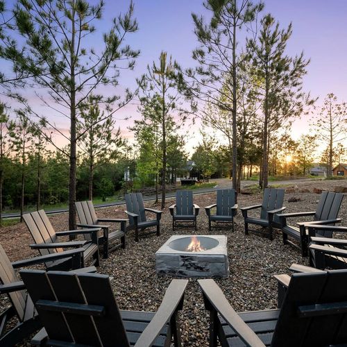The outdoor firepit with Adirondack chairs!