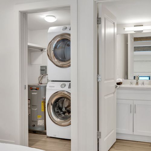 In-unit washer & dryer stacked & ready — laundry on your schedule.