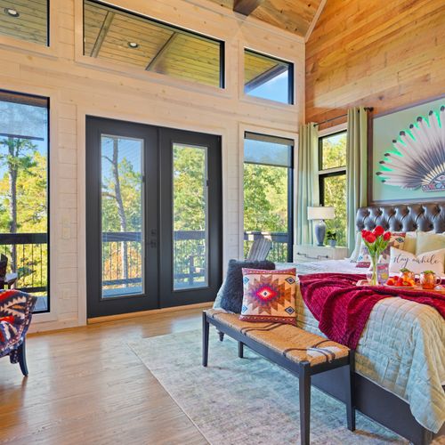 Rich patterns, native textiles, and warm tones create a bedroom full of culture, comfort, and character.