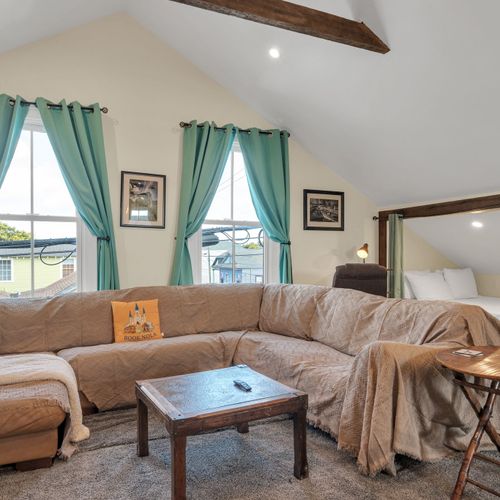 Kick back in the loft lounge w/ a comfy sectional sofa & entertainment area.