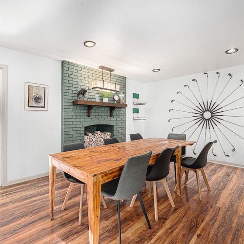 The kitchen overlooks the gorgeous main dining area, enhancing the connection between cooking and dining spaces.