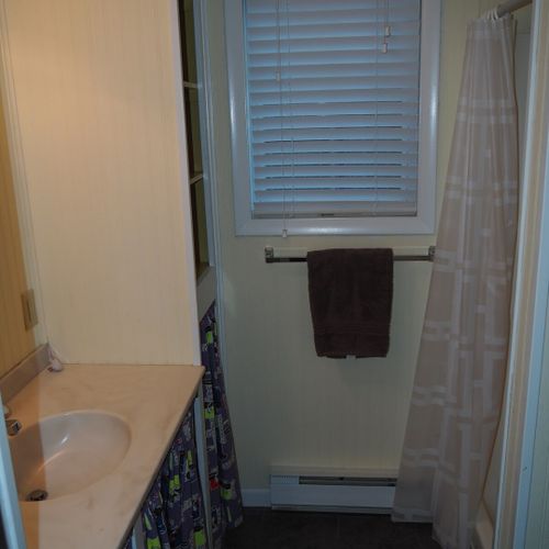 Bathroom #2 (first floor):  full bathroom on the first floor. It is located near the two first floor bedrooms.