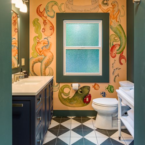 Another page of history is preserved in the full bathroom on the main floor.  Whimsical, authentic and preserved for pure fun, this mural from the 1940's takes you back to a time when humor was shared in Latin.