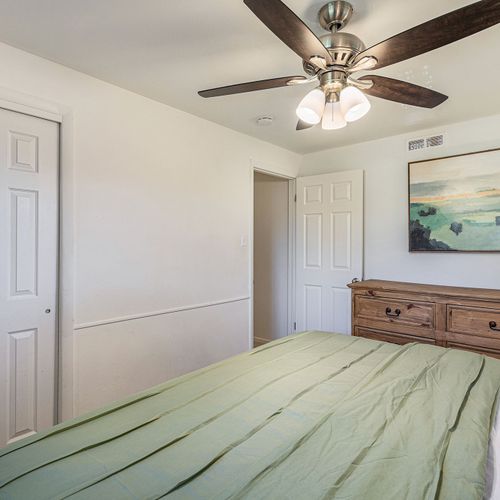 Enjoy a clutter-free stay with ample dresser and closet space in this upper-level bedroom retreat.