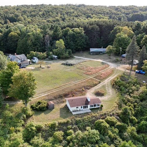 Overview:  looking at the cottage from up above crystal lake.
