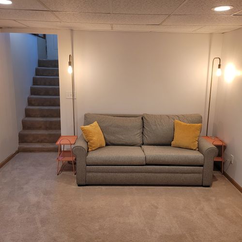 Living room #2:  the basement's comfy cozy living room with a sofa bed for watching tv